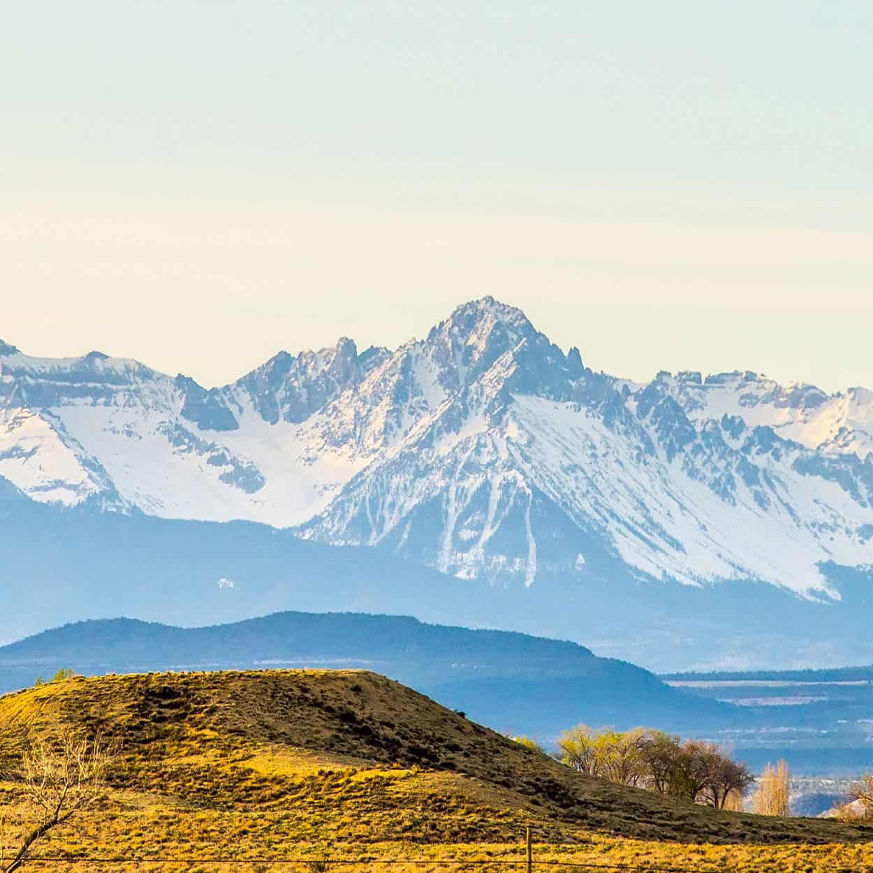 Image of the Colorado foothills with a mountain range in the background