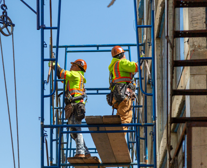 Agricultural building contractors in the process of constructing a facility