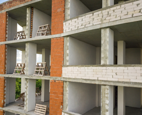 building in construction during the brick masonry process