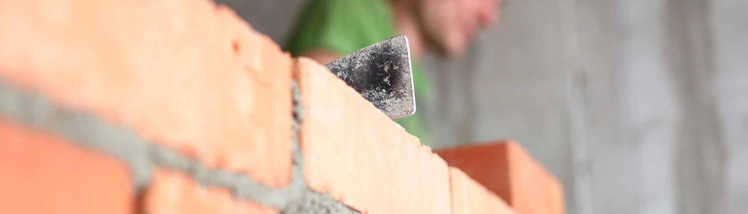 people performing masonry services
