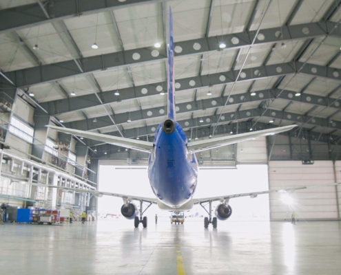 Image of a pre-engineered metal aviation hangar.