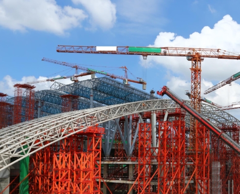 Image of a pre-engineered steel structure being constructed.