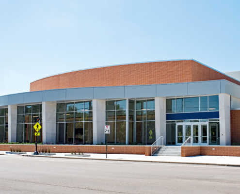 Contemporary Red Brick & Glass Convex School Building