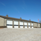 Side view of the exterior of a firehouse on a clear sunny day