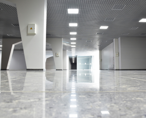 Unfinished building interior, white hall