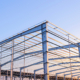 Metal columns structure and steel roof beam framework of industrial warehouse